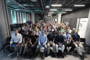 Large group photo of attendees and organizers at WP Agency Forum 2025.
