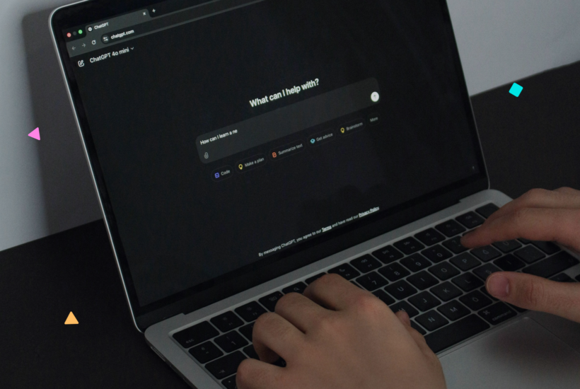 Hands typing on a laptop with ChatGPT open, illustrating how AI answer engines are reshaping the way users search for information online.