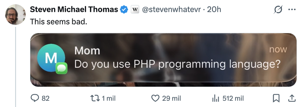 Screenshot of a post on X by Steven Michael Thomas reading “This seems bad,” above a phone notification from “Mom” asking: “Do you use PHP programming language?”